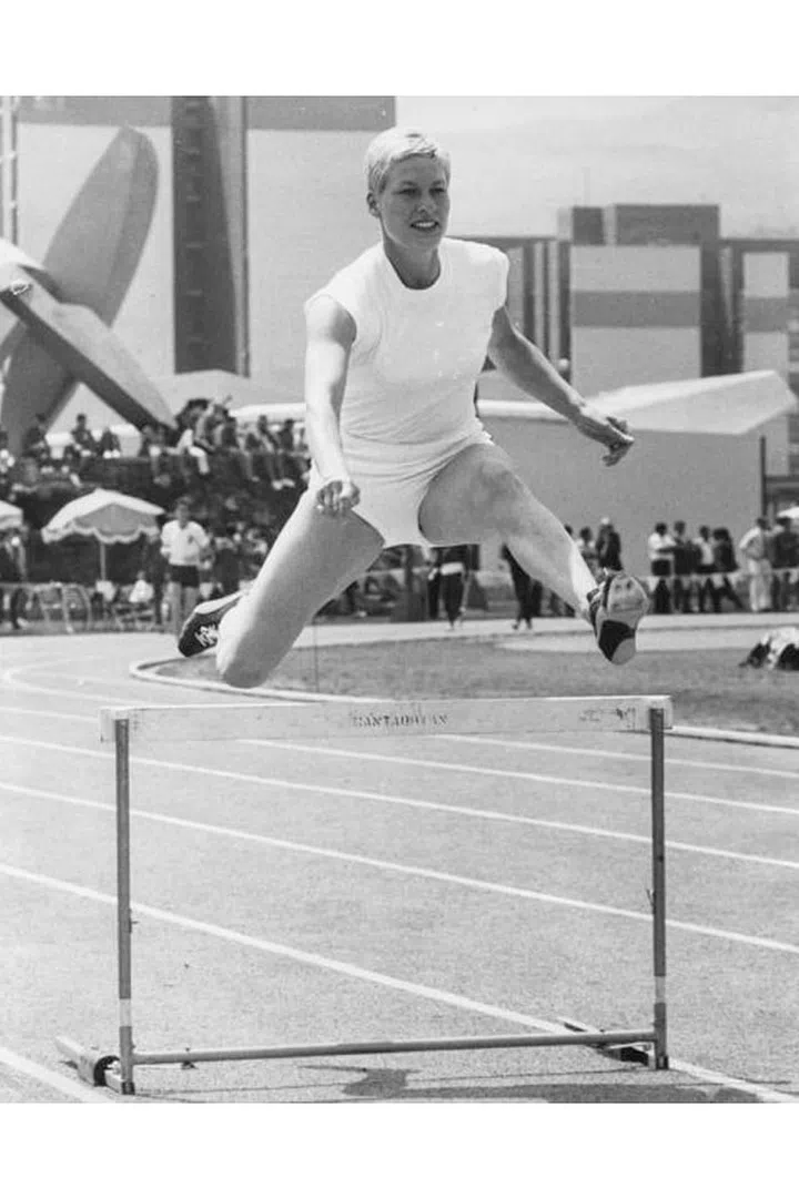 British athlete Pat Bryce-Nutting jumping over a hurdle during training at the track in Mexico. Given the heat in Mexico, short-shorts are a popular choice for athletes, and elastene spandex continues to revolutionize sportswear. Photo: Getty
