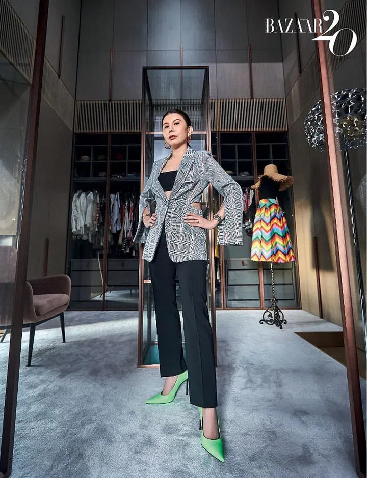 Chuah Woei Woei in her two-storey walk in wardrobe wearing her Alexander McQueen jacket, Dior cropped camisole, Moschino trousers and Balenciaga pumps with Fendi earrings, bangles from Cartier and Tiffany & Co., her engagement ring and a Patek Philippe watch.

Photo: Phyllicia Wang