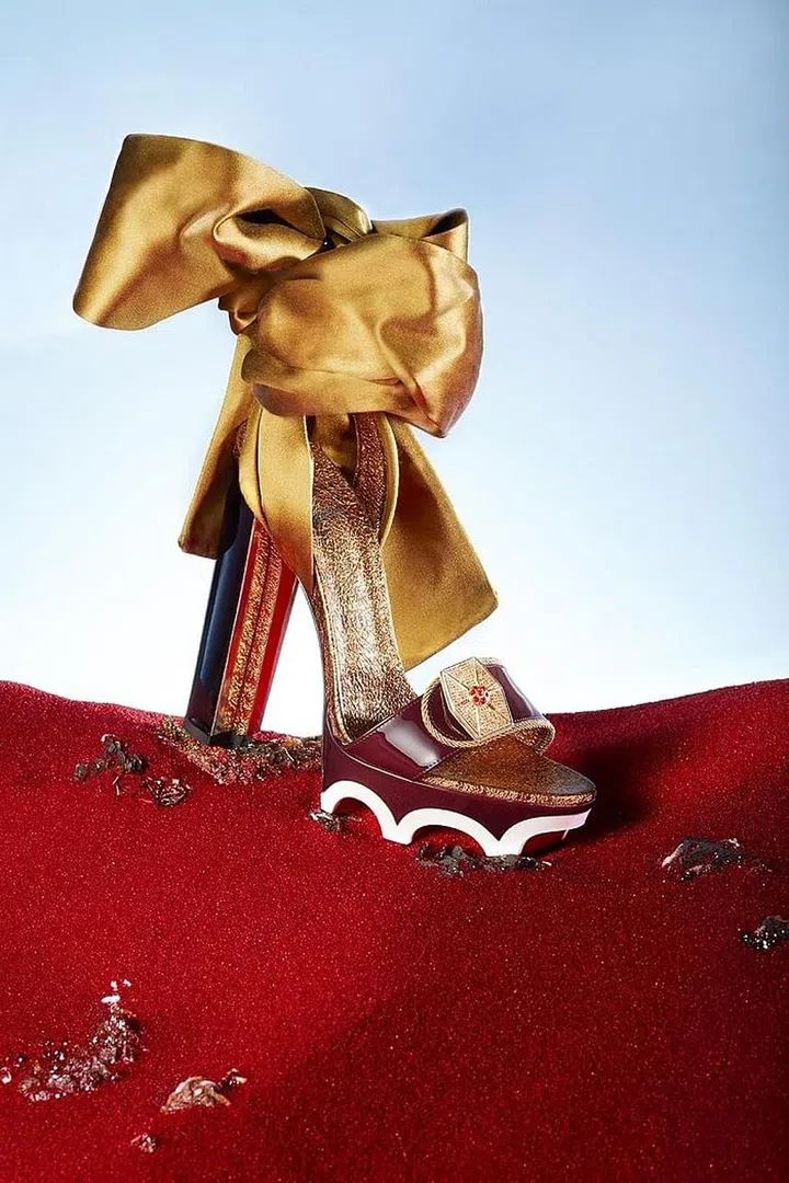 Even Star Wars newbie Rose Tico (Kelly Marie Tran) gets featured in the collection. As a maintenance worker in the Resistance, her design includes utilitarian details, as told by the block heel surrounding an inner stiletto, and a sandy ribbon ankle strap reminiscent of the color of her uniform. Photo: Guillaume Fandel