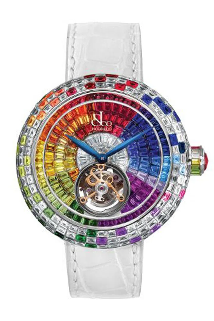 Named for the famous checked costume of the "Harlequin" character, 225 rainbow color sapphires and 169 baguette diamonds are invisibly set within the white gold Jacob & Co Brilliant Flying Tourbillon Arlequino. The manually-wound movement features a mesmerizing tourbillon complication, adding precise accuracy to a colorful watch with over 100 hours of power reserve.
Jacob & Co Brilliant Flying Tourbillon Arlequino, Price Upon Request, Available at Jacob & Co, New York City, 212-719-0408 or jacobandco.com