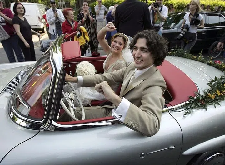 Leaving their wedding ceremony at the Sainte-Madeleine D'Outremont Church in Montreal, Canada. Photo: Getty 