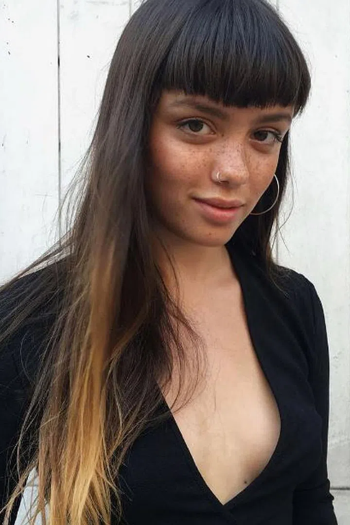 London-based model Emily Bador makes a case for short bangs that highlight strong brows. (Also, those freckles? Swoon.) Photo: Instagram @darth_bador