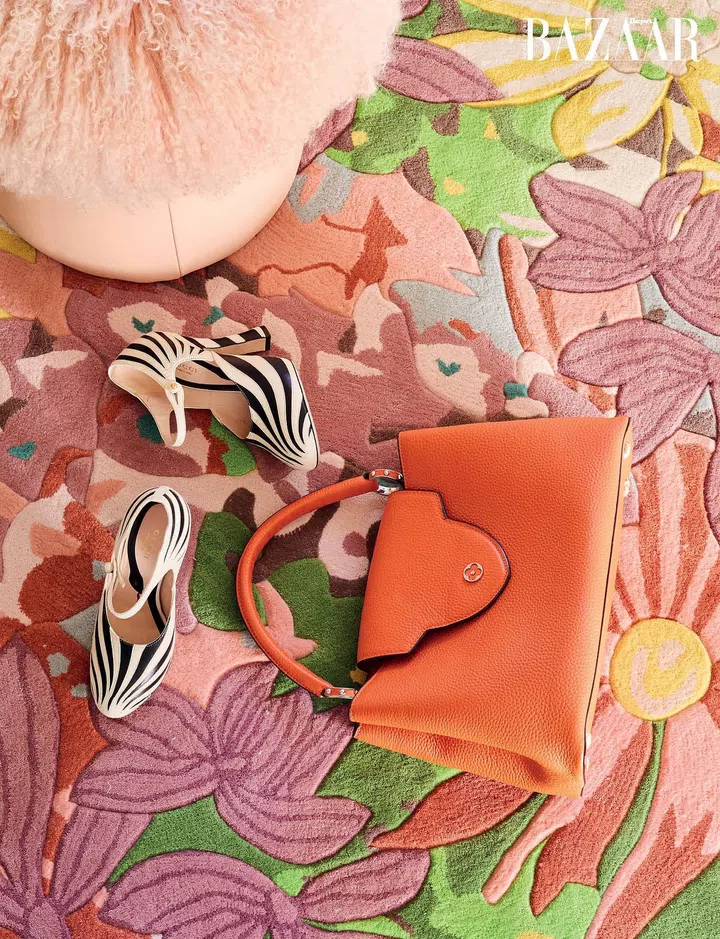 On a custom carpet of her own design are her own Gucci pumps and Louis Vuitton bag. Photo: Lawrence Teo