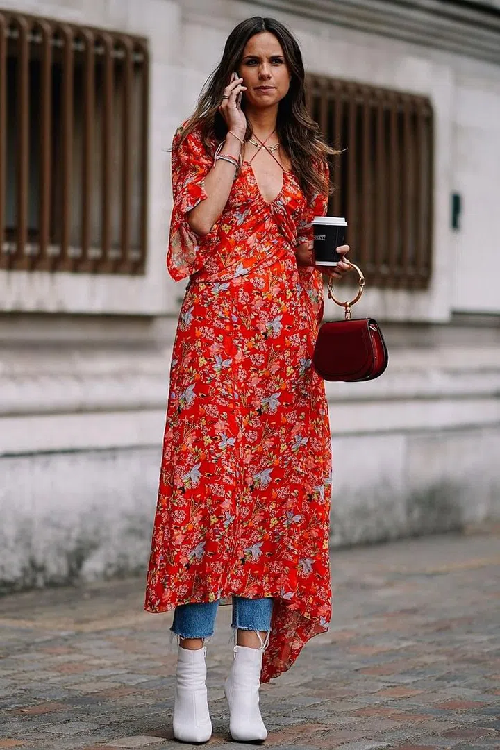 Even if you're showing just a hint of denim, it will give an undeniably cool spin to your ensemble so wear ankle-length frocks and show just the very bottom of your skinnies. Photo: Getty 