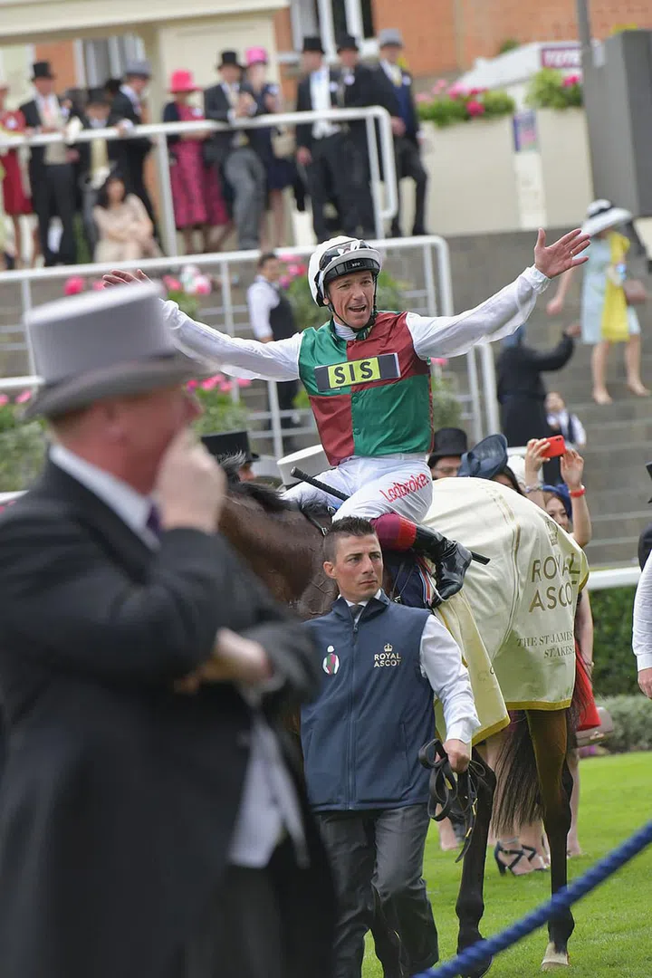 Jockey Frankie Dettori celebrates his win.
Photo: Getty
