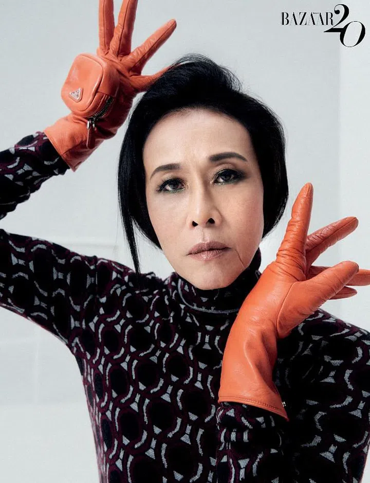 Bodysuit; gloves, Prada.