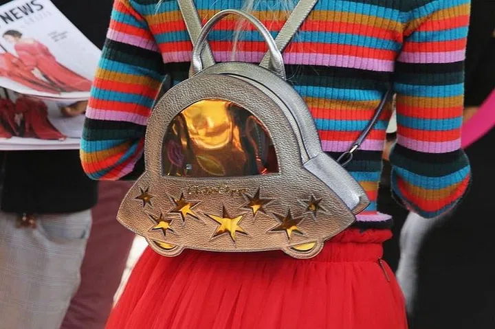 The tiny backpack had the two main factors required to make a comeback: nostalgia and enough distance for young people to think, "Hey, I'm too young to have done that the first time around". And once again, according to the circle of life, the charm is starting to wear off.

'In' Alternative: Well, you could do a backpack with regular dimensions.