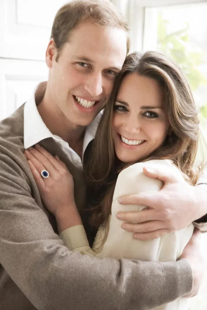 LONDON - NOVEMBER 25: (NO SALES/EDITORIAL USE ONLY)  In this handout photo, one of two official portrait photographs, Prince William and Miss Catherine Middleton have chosen to release to mark their engagement, released by Clarence House Press Office on December 11, 2010, Prince William and Miss Catherine Middleton pose in the Cornwall Room in St James's Palace on November 25, 2010 in London, England. (Mandatory Credit/Photo by Mario Testino/Clarence House Press Office via Getty Images)These photographs are for editorial use only and are not approved photographs for souvenirs and memorabilia. The photographs should be accompanied by a caption explaining that the photographs were taken as the official portrait photographs for the engagement of Prince William and Miss Catherine Middleton. Mario Testino must be credited as the photographer (Copyright 2010 Mario Testino). The photographs must not be digitally enhanced, manipulated or modified, and must include Prince William and Miss Catherine Middleton when published. There is no charge for the supply, release or publication of these official photographs for editorial use. Any use outside these terms must be cleared by the Clarence House Press Office.