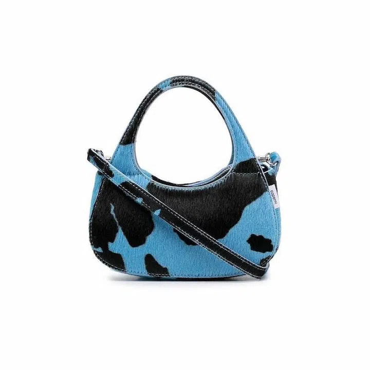 Mini Swipe Cow-Print Bag, $533, Coperni at Farfetch
