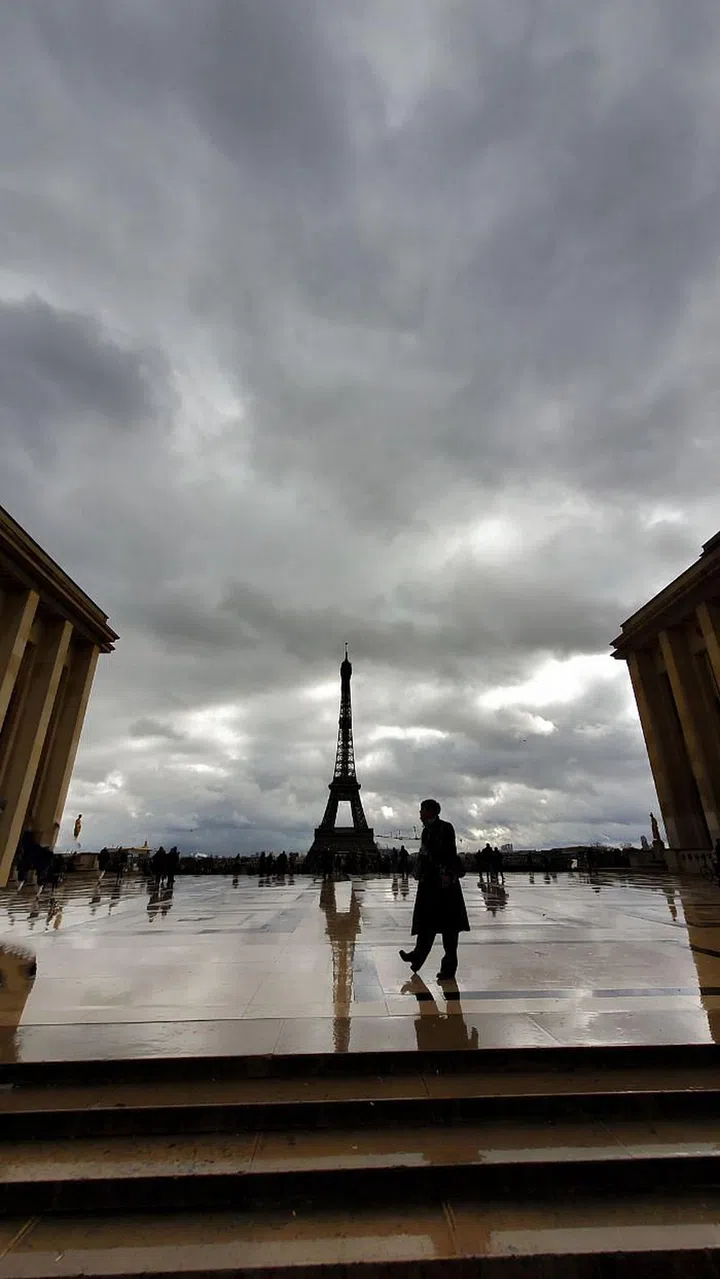 The lines of the tiles of the Trocadéro lead the eye to the Eiffel Tower