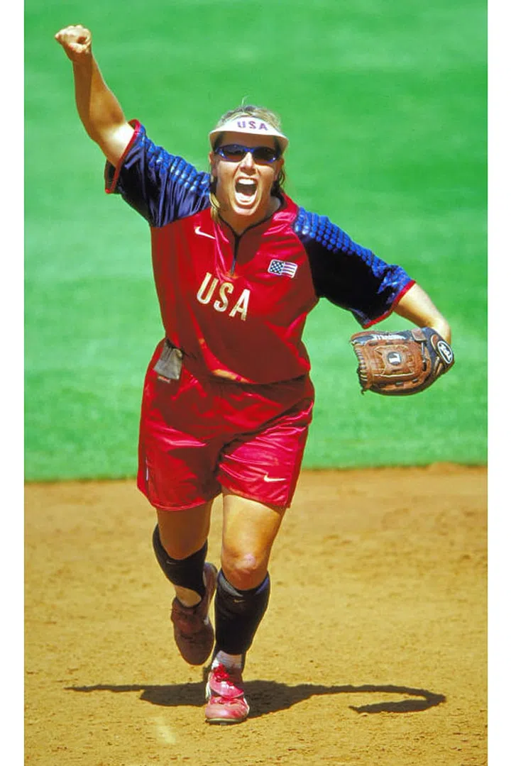 Dot Richardson of the U.S. celebrates during a preliminary match against Japan at the Sydney Olympics. Photo: Getty
