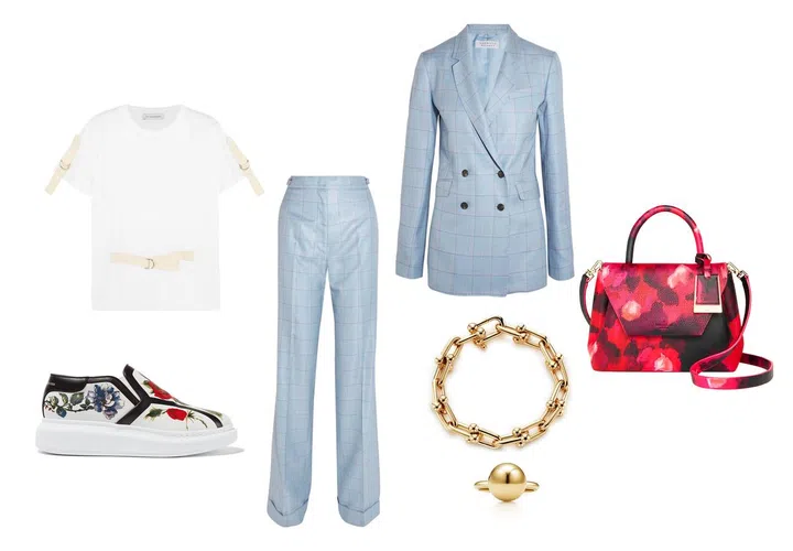 Top, J.W. Anderson. Slip-on shoe, Alexander McQueen. Pants; blazer, Gabriela Hearst at Net-a-Porter. 18k yellow gold Tiffany HardWear large link bracelet; 18k yellow gold Tiffany HardWear ball ring in 12mm, Tiffany &amp; Co. Bag, Kate Spade New York. 