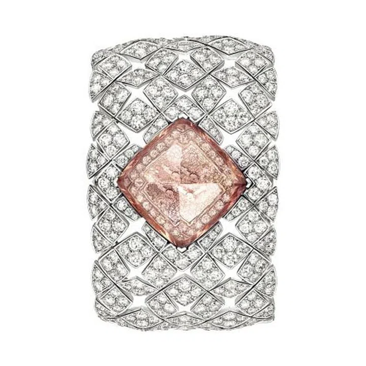 A secret watch for you, and you alone. The Signature Morganite watch by Chanel, part of Les Éternelles de CHANEL collectionis, is a one-of-a-kind bracelet set with 953 brilliant-cut diamonds (103.8 carats) and a 43.6 carat faceted cushion-cut Morganite stone that lifts to reveal a hidden timepiece located beneath the colossal pale pink stone. 
Price Upon Request. chanel.com