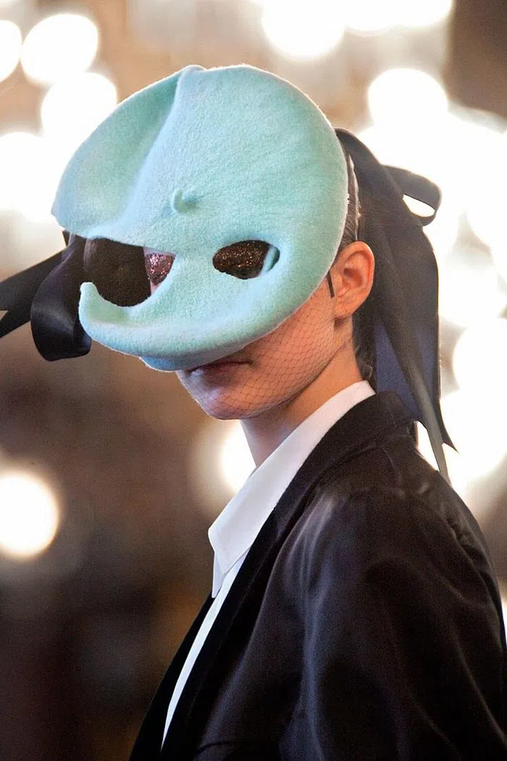 For autumn/winter 2006, it was all about "the persona — what's in front, and what's behind," which saw a fusion of menswear with Victorian-inspired fashion. Venetian masks and deconstructed berets finished it off. Photo: Getty