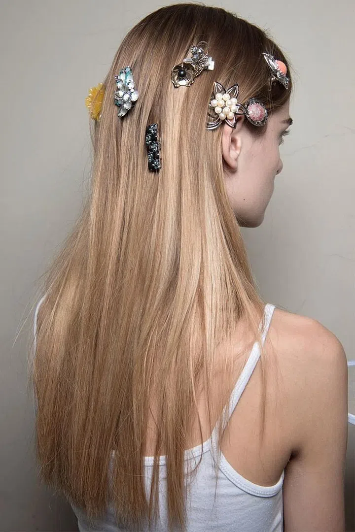 The hair look at Toga brought to light an important beauty question: why wear one hair pin when you can wear seven?