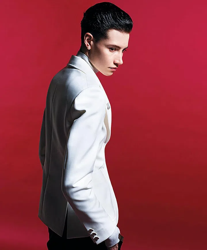 Louis Vuitton blazer, turtleneck, and pants
