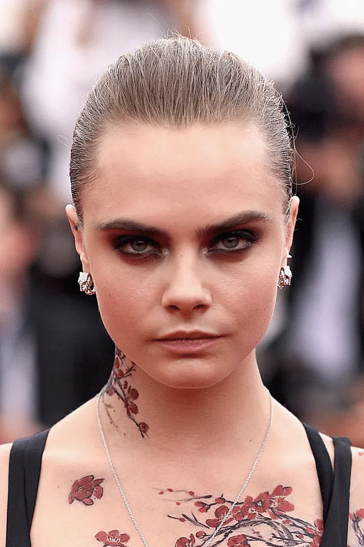 Ready for war in a tight bun and dark, dark eyes.