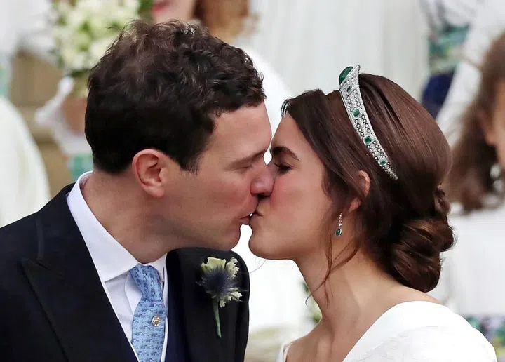 Jack and Princess Eugenie flaunting their love for the crowds and cameras.