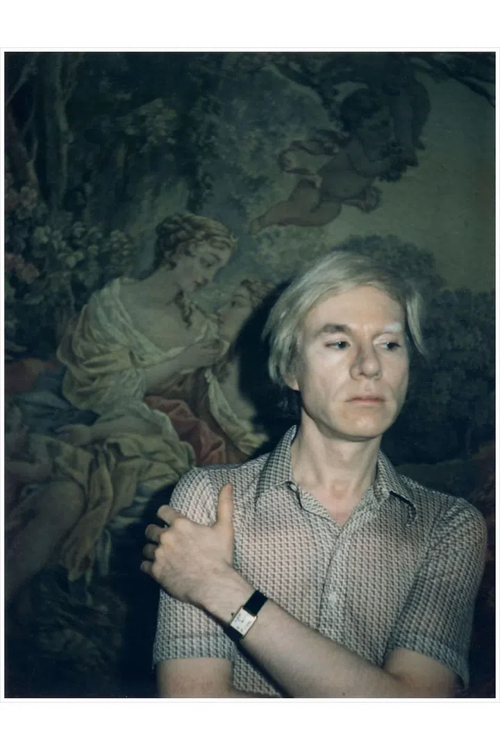 Warhol wears a Cartier tank watch. Circa 1970. Photo: The Andy Warhol Foundation