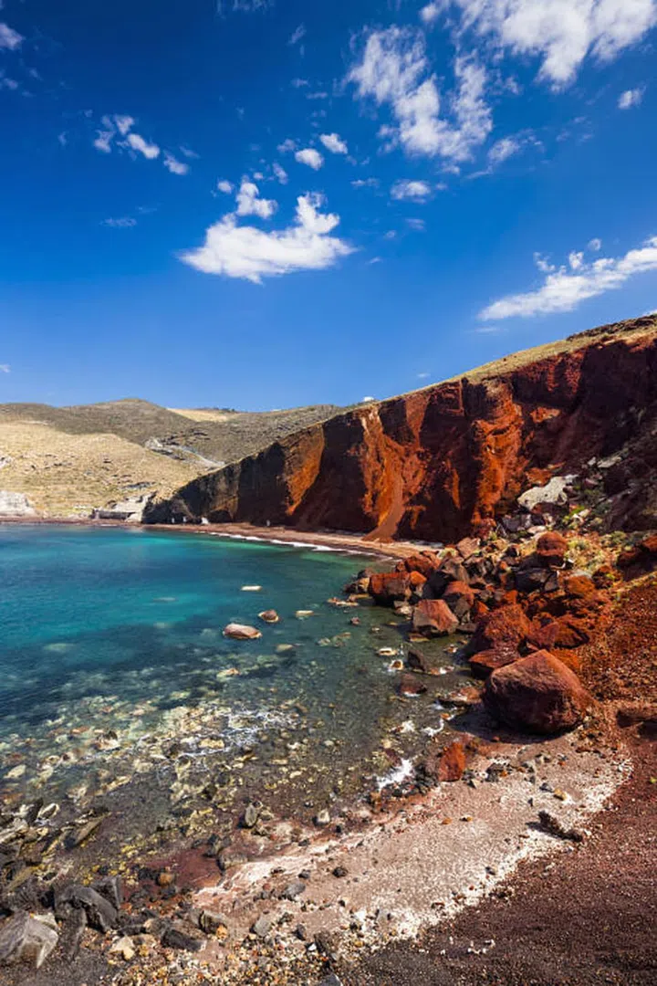 Can't decide on which Greek island to go to? Pinners are partial to Santorini for its unusual Red Beach on the island's south coast. Photo: Getty 