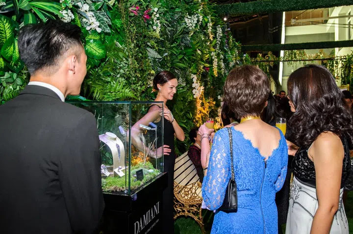 Guests viewing exclusive timepieces by the likes of Zenith & newly opened Girard Perregaux at the Garden of Enchantment