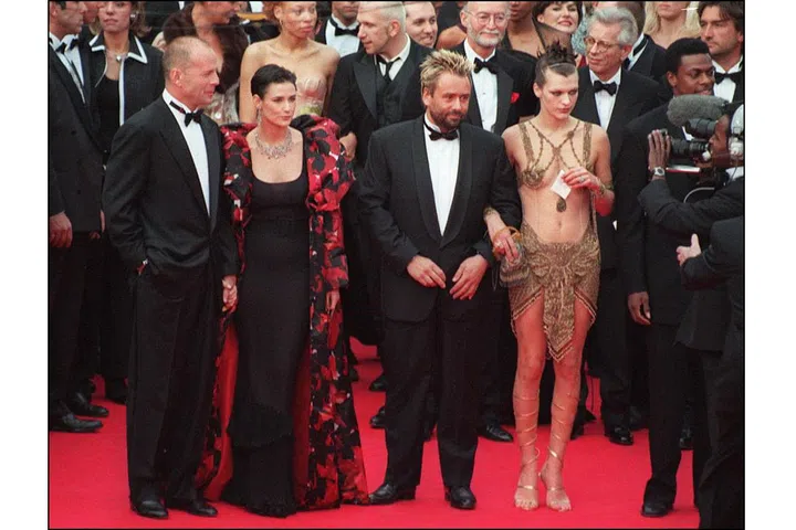 OMG, it's like you've never seen a woman wearing a gold chainmail loin cloth with a matching nipple harness, Bruce Willis? Photo: Getty