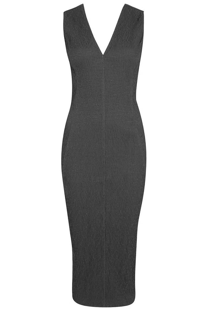 Layer up with a shirt or poloneck during the winter or wear alone in the warmer months. Rick Owens Linen Dress, £740. 