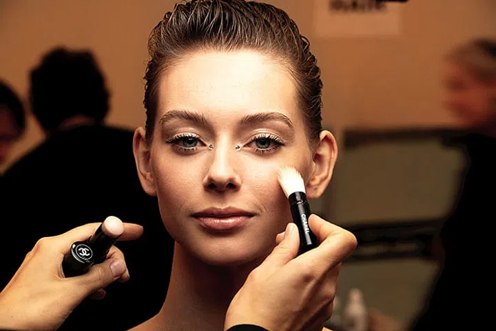 Perfect for re-creating the high gloss eyes of the show for every day, the Baume Essential Transparent adds freshness to a look and highlights naturally. Photo: Courtesy.