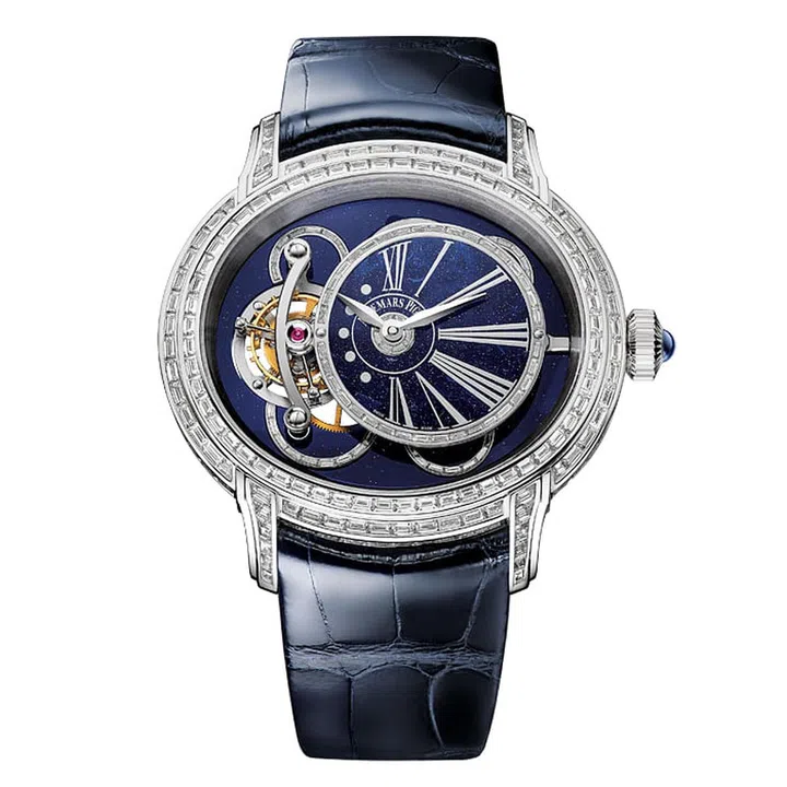 Audemars Piguet’s Millenary Tourbillon has everything a woman wants in a watch: Pedigree looks that are heightened by a multi-layered dial and diamond bezel; prestige that comes from having a much sought-after watch complication, the tourbillon; and elegance, thanks to a flattering oval-shaped case that creates the illusion of slimmer wrists. A blue aventurine dial that mimics a starry night sky completes the perfection.