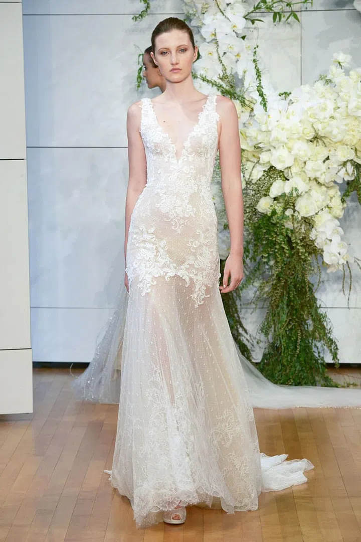 For a more sultry taste on pastoral backdrops, opt for low-cut necklines, sheer elements and body-con silhouettes. Monique Lhuillier "Dylan" sheath, moniquelhuillier.com. 