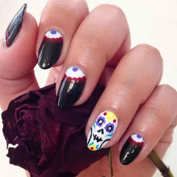 Lace detail cuticles, ring finger calacas, by Beverly Hills manicurist Sigourney B. Nuñez (@nailartbysig).
