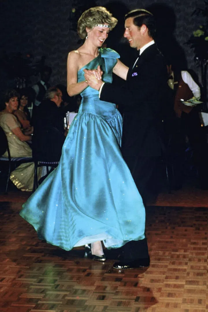 For a 1985 appearance in Melbourne, Australia, the fashion icon accented her gown with an emerald-and-diamond choker — but she wore it as a tiara. We're pretty sure that wasn't quite how the Queen, who gave the necklace as a wedding gift, imagined the art deco treasure being displayed.