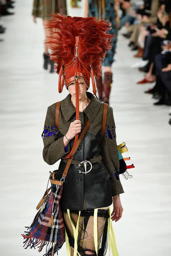 Wait, have I been wearing handbags wrong my whole life? Photo: Getty
