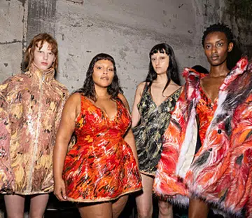 Paloma Elsesser and models backstage at Marni fall/winter 2024