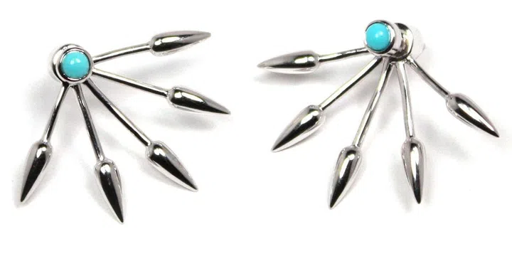 Photo: Pamela Love earrings, $275, pamelalove.com.
