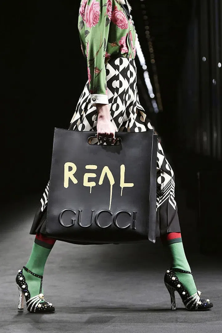 Gucci's collaboration with graffiti artist GucciGhost melds the of-the-moment streetwear vibe with the It brand of the moment to create the must-have bag of the season. Photo: Getty
