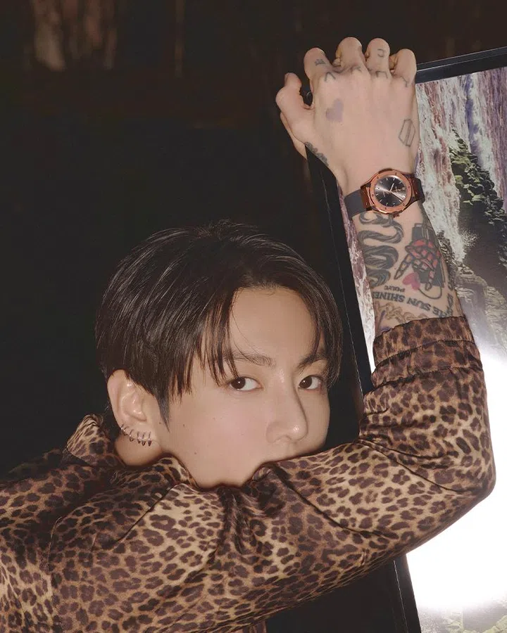 harper’s bazaar singapore june 2026 cover story | jung kook wearing ernest w baker leopard print jacket and hublot classic fusion racing grey king gold watch