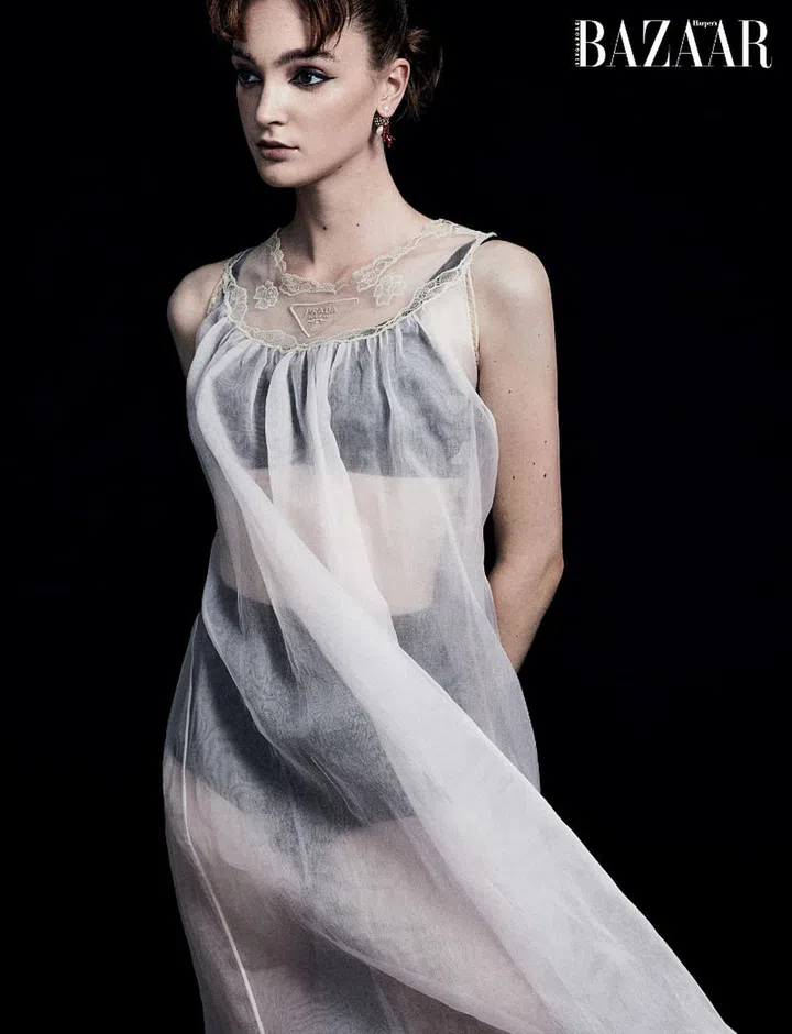Dress; underwear, Prada. Earring, Dior. Bra top, Stylist’s own.