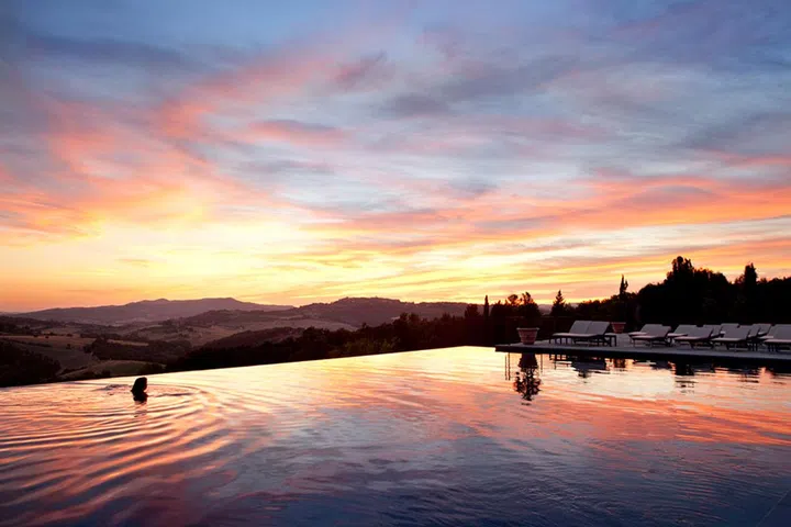 The 10th-century castle-turned-boutique-hotel has a stunning heated pool with breathtaking views of the Tuscan countryside. "Our magical infinity pool offers the best views and perfect cocktails, served from the Pommery bar, which are the best way to celebrate the golden sunset hour," says the property's general manager, Federico Galligani.