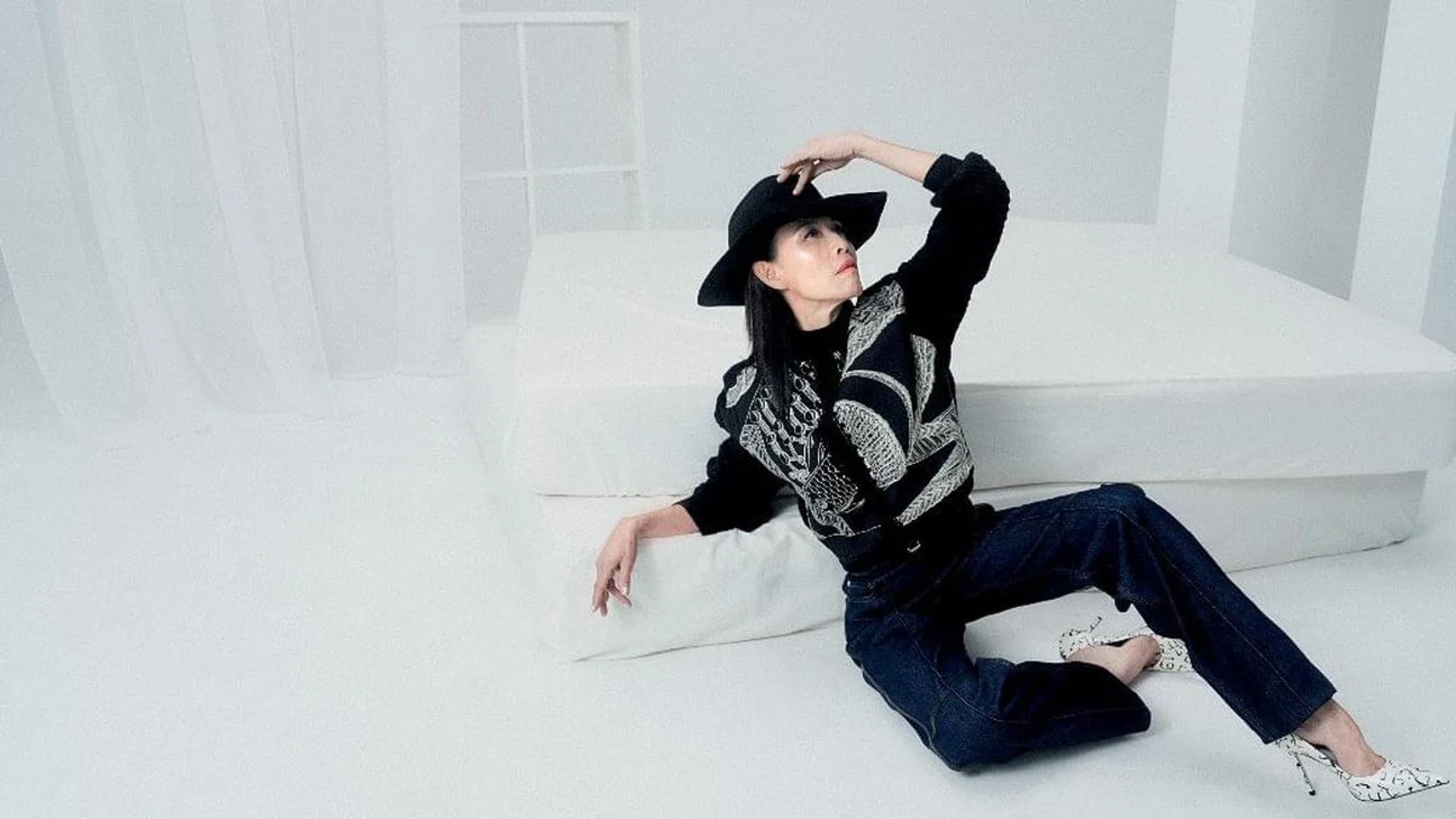 Sweater; jeans, Hermès. Hat, Max & Co. Pumps, Jimmy Choo.