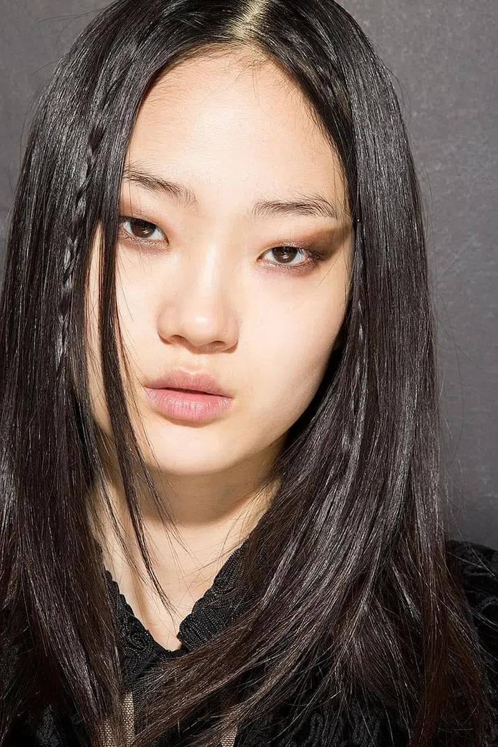 At Jill Stuart, hairstylists weaved one baby braid on each side of the models' head. 
