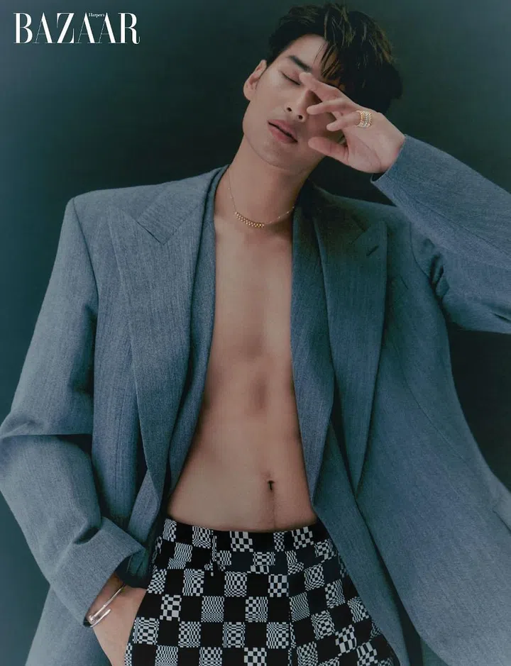 Blazer; trousers, Louis Vuitton. Rings; necklace; bangle, Cartier.