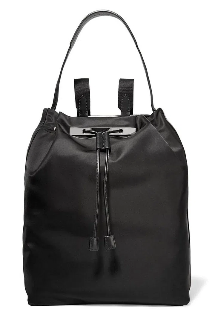 The Row has understated luxury down to an art. It's backpacks imbue its imnimalist luxe appeal. Leather trim satin backpack, £1,150