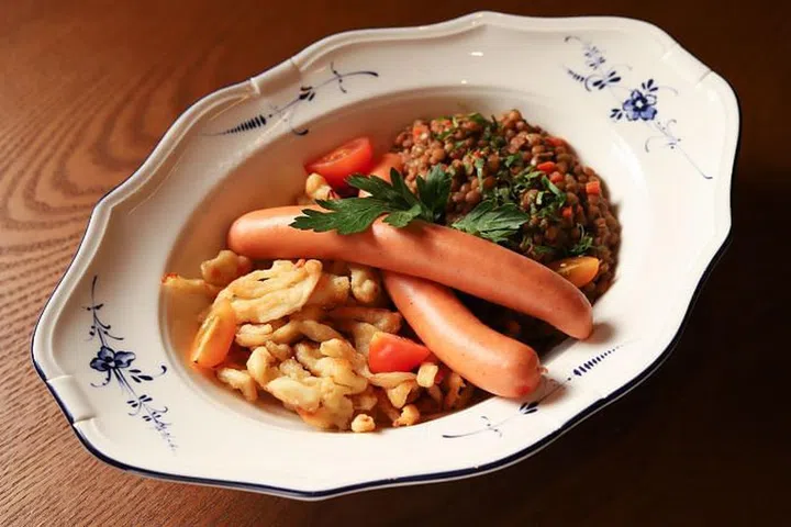 Swabian lentil stew with homemade noodles and smoked pork sausage.

Photo: Courtesy