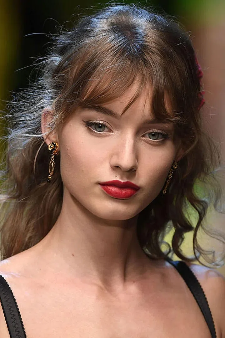 Classic creamy red lipstick is a staple on the Dolce & Gabbana runways.