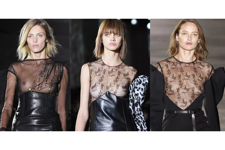 Vaccarello is known for his sexy, slit-up-to-there dresses. At YSL, his sexy aesthetic manifests in sheer everything, particularly lace insets in '80s-style leather mini dresses and filmy camisole tops. There wasn't a slit skirt in sight.