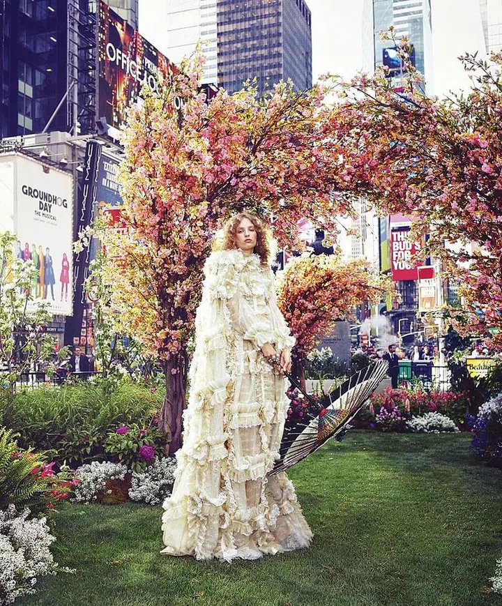 On Petra Collins in Gucci cape, $25,000; gown, $28,000, earrings, $410; and rings, $880, gucci.com. Photo: Alexi Lubomirski