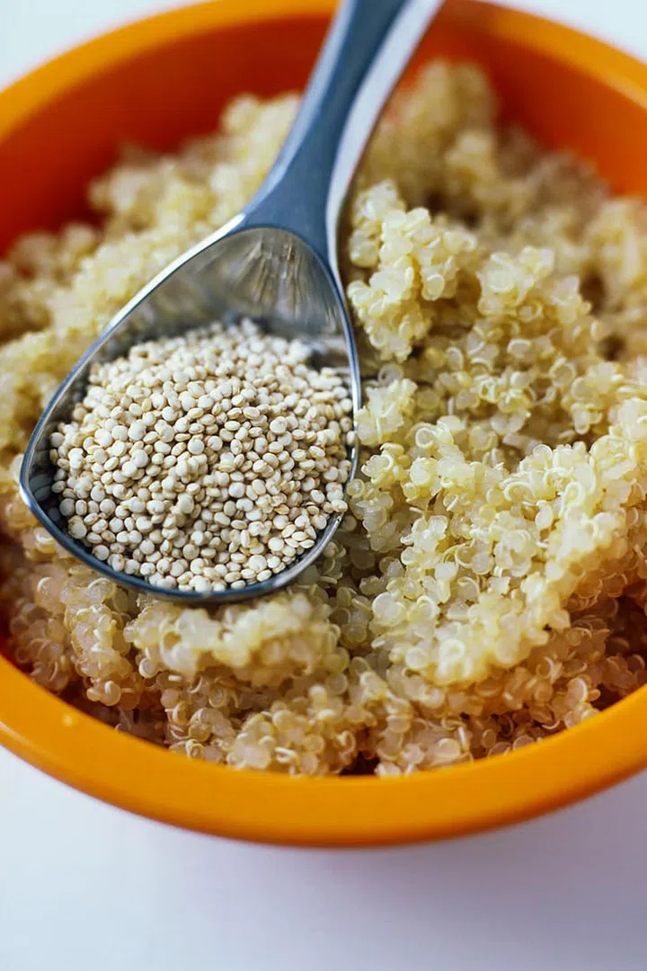 Since this powerhouse grain contains nearly twice as much fibre as others, its nutrients get released much slower into the bloodstream, keeping sugar levels balanced and increasing your metabolism. Also, compared to other modified gluten-free foods, naturally gluten-free quinoa has been shown to aid in weight loss, since it produces lower free fatty acid levels, which are linked to insulin resistance.