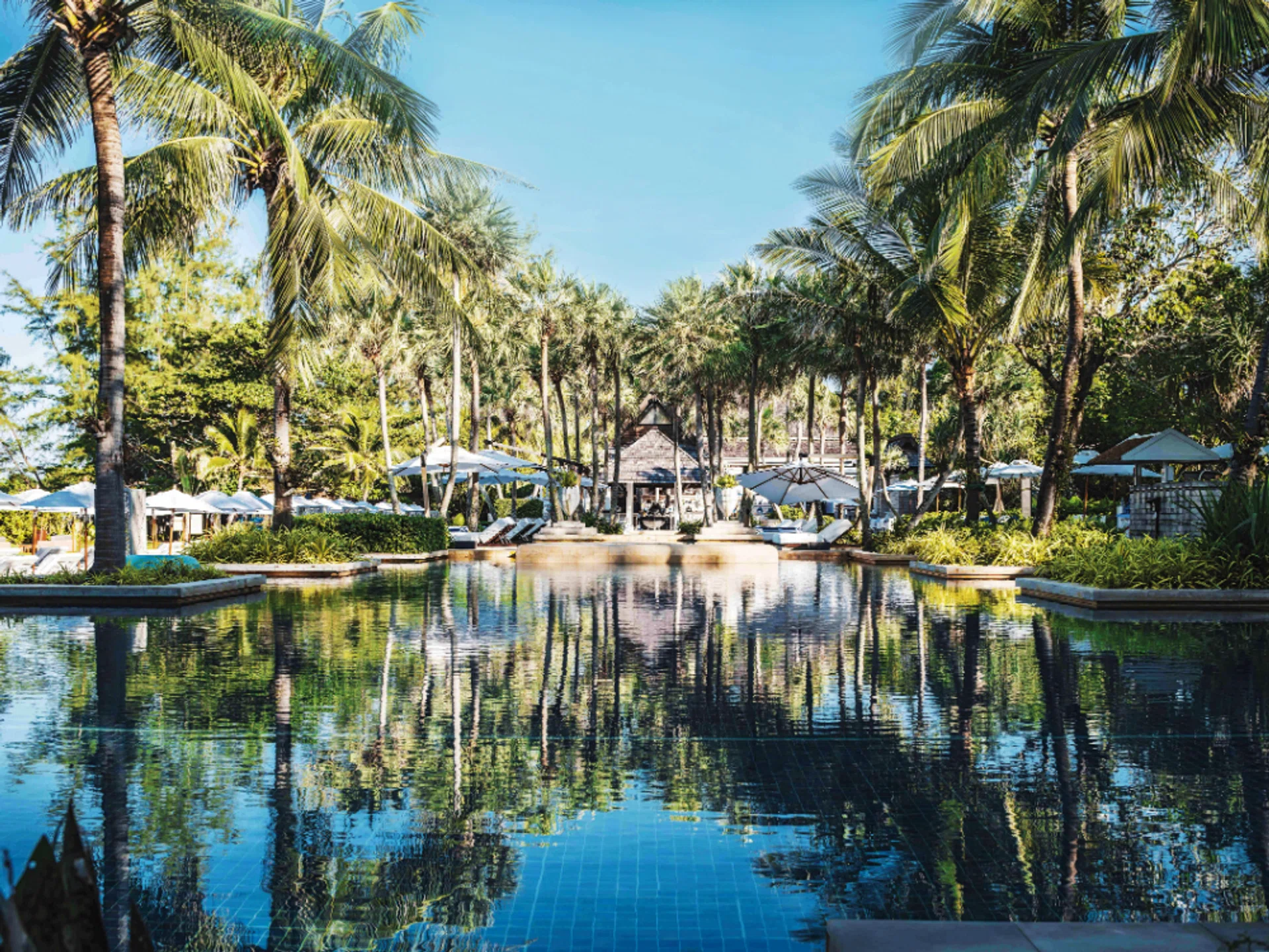 The beautiful inviting emerald waters of the main pool where you can lounge all day in the cabanas sipping cocktails, or hop across to the beach just beside the gardens. 