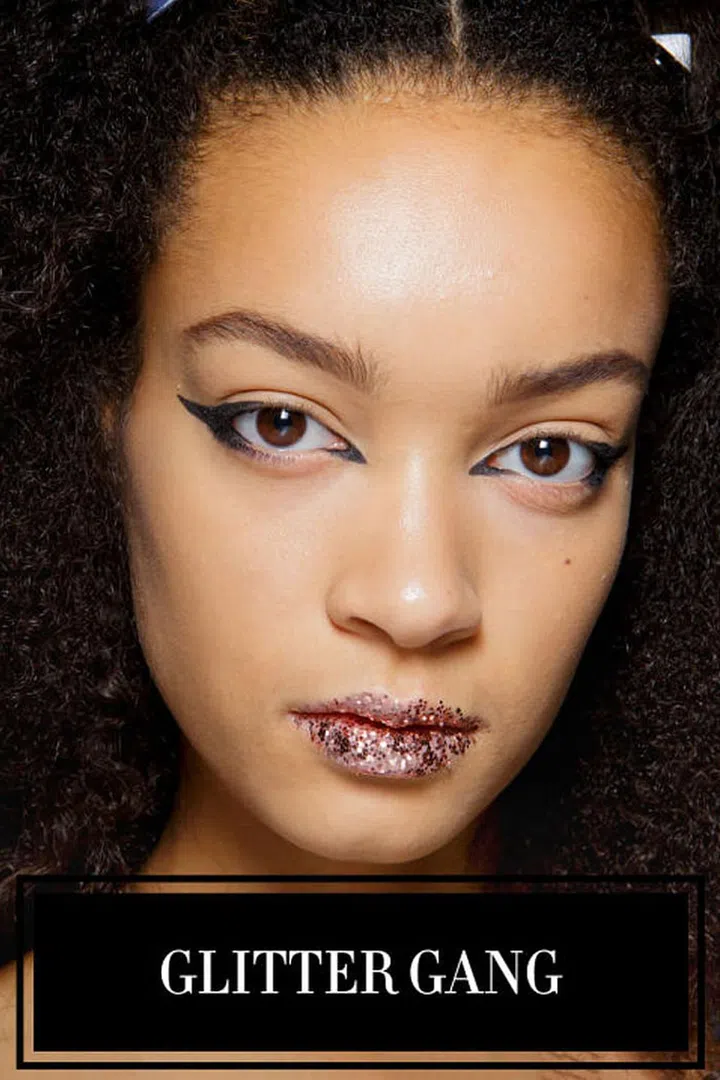 The glitter trend is here to stay, but it's evolving into a more artistic version of the trends we saw last year. At Fendi, for example, the models' lips were covered in a chunky pink glitter that was meant to evoke the look of a cartoon anime character. Then at other shows like Giamba and Maison Margiela, glitter was used in odd places like the eyebrows and forehead. It looks like we'll all still be shining for at least one more season.